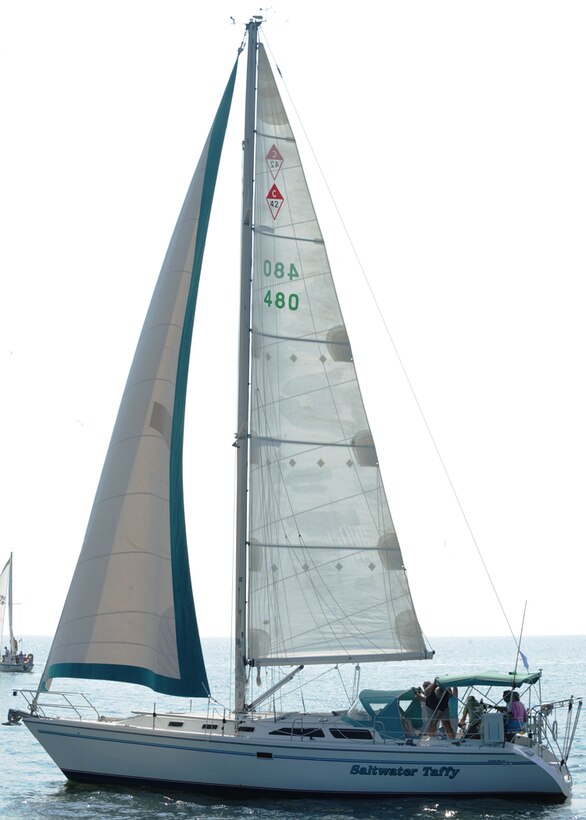 LANGLEY AIR FORCE BASE, Va. -- A sailboat named Saltwater Taffy circles the area here July 25. The Saltwater Taffy is one of more than 20 boats registered for the Veteran's Cup 2009 Sailing Regatta, a sailboat race held in the Chesapeake Bay. This event is put together and run by the Langley Yacht Club.  (U.S. Air Force photo/Airman 1st Class Jonathan Koob)