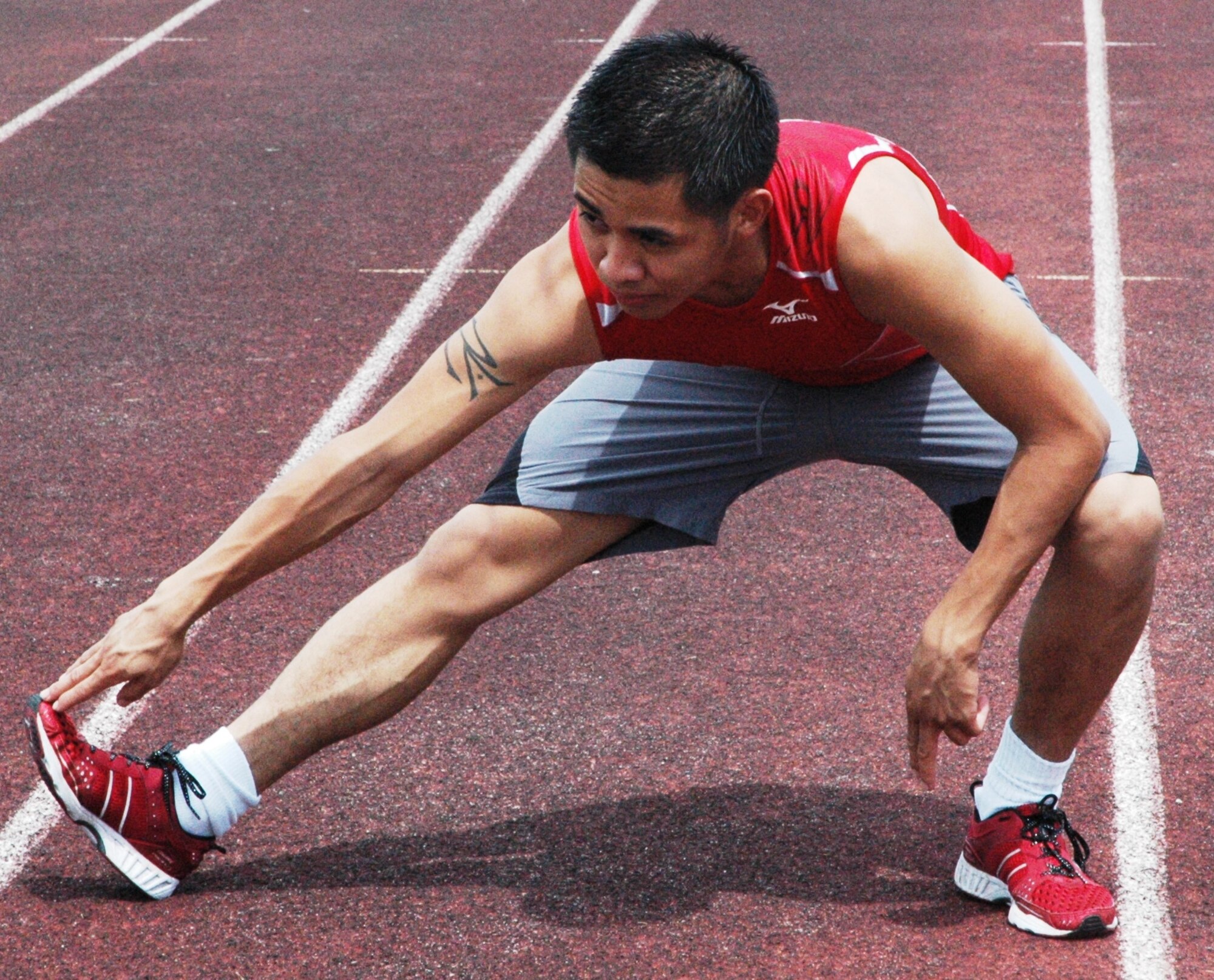 Airman Kristofer E. Chacon trains at Tyndall’s base track to prepare for the 2009 Air Force Marathon, where he will run the 10K for the Air Education Training Command.  (U.S. Air Force photo/Airman 1st Class Rachelle Elsea)