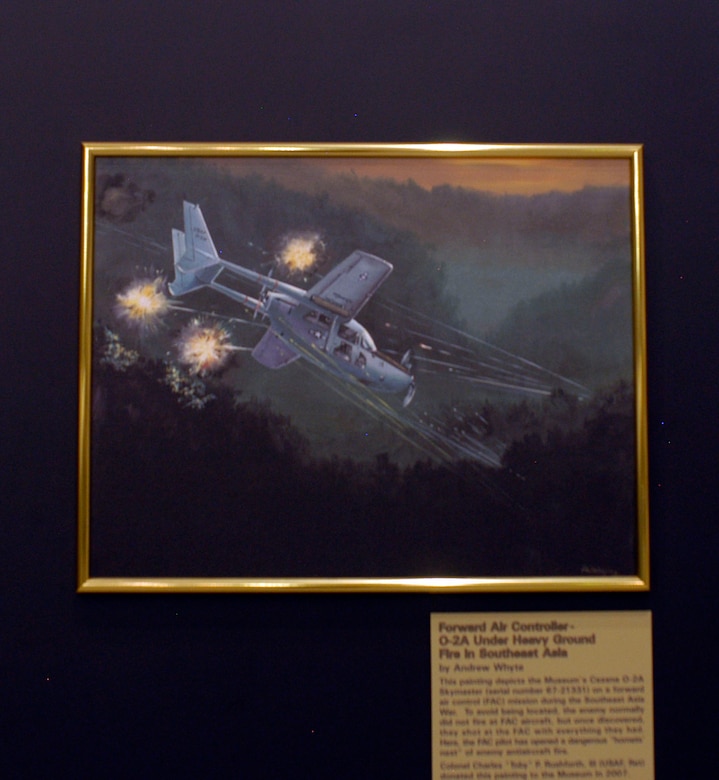 DAYTON, Ohio - "Forward Air Controller: O-2A Under Heavy Ground Fire in Southeast Asia" by Andrew Whyte, on display in the Southeast Asia War Gallery at the National Museum of the U.S. Air Force. (U.S. Air Force photo)