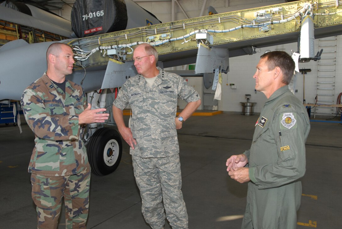 Colonel James Compton and Captain Eric Newman explain the modifications being made to an A-10 Thunderbolt II to Chief of the National Guard Bureau Gen Craig McKinley during a visit to Gowen Field in Boise, Idaho. Colonel Compton is the Commander of the 124th Wing and Captain Newman is a Maintenance Officer with the 124th Maintenance Squadron, Idaho Air National Guard in Boise.
(Air Force photo by Master Sgt Tom Gloeckle)(Released)