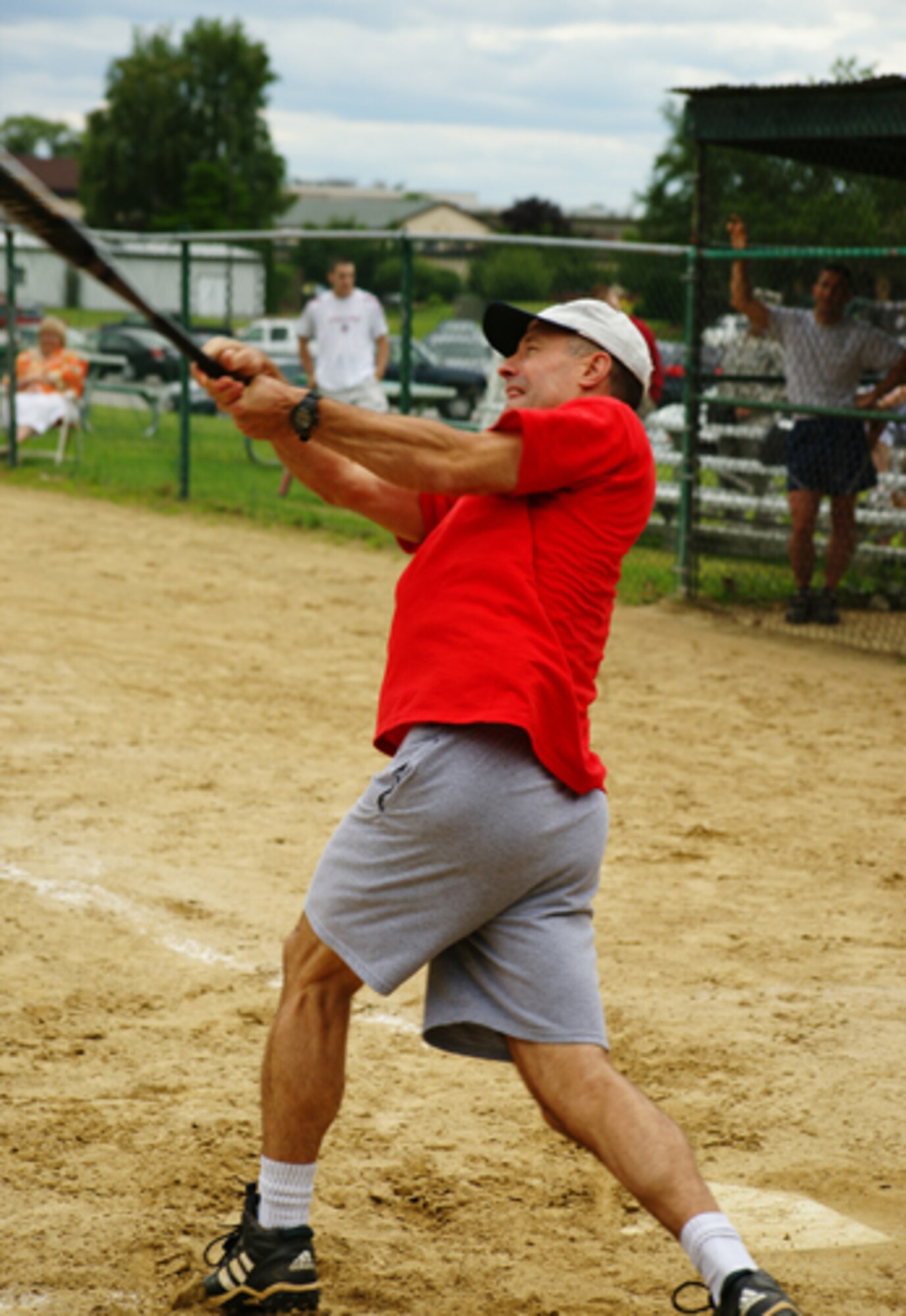 Col. Dave Orr, 66th Air Base Wing commander, swings at a pitch during a softball game he played with other Hanscom colonels and Top 3 members as they took on the Hanscom Company Grade Officers team. Colonel Orr had one RBI in the colonels and Top 3 members 12-20 loss to the CGOs. (Courtesy photo by 1st Lt. Chris Wenz)