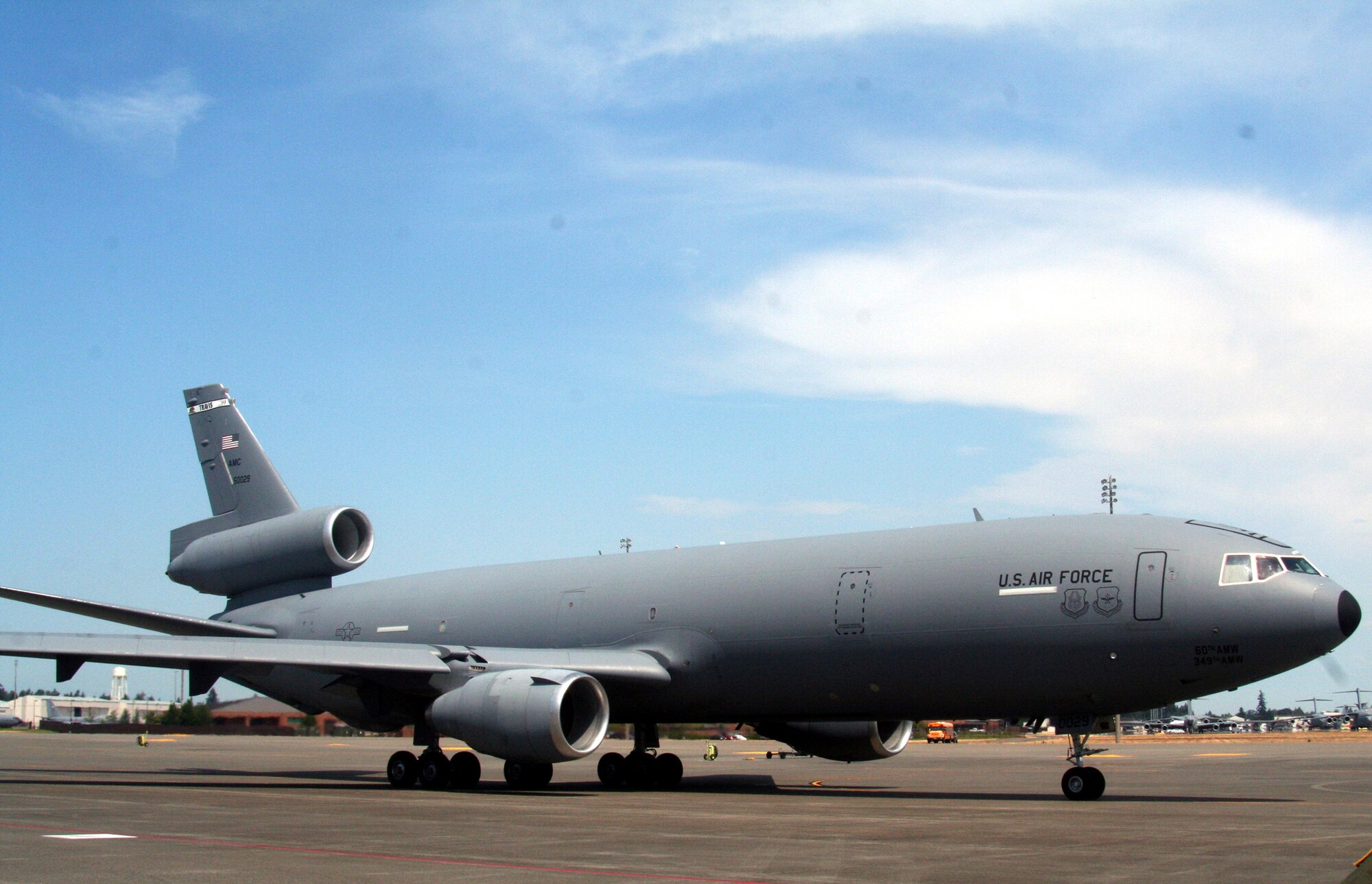 A KC-10 Extender from the 60th Air Mobility Wing, Travis Air Force Base, Calif., taxis for a flight at McChord AFB, Wash., July 25, 2009.  The KC-10 is one of the Air Mobility Command's main air refuleing planes that helps provide "global reach" and the Air Force to "fly, fight and win...in air, space and cyberspace."  (U.S. Air Force Photo/Tech. Sgt. Scott T. Sturkol)