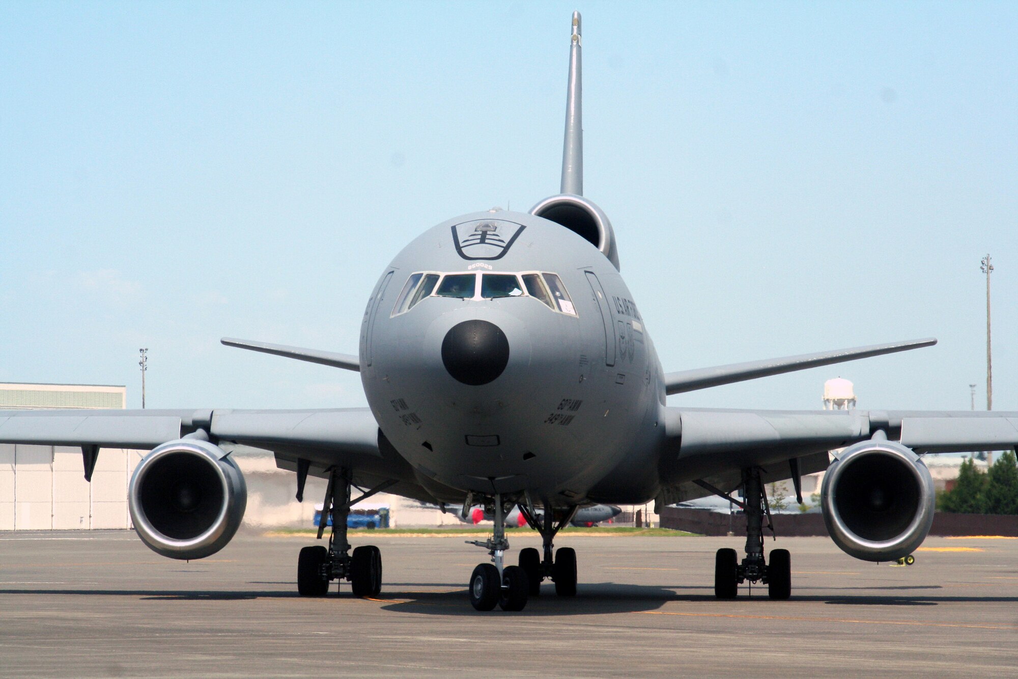 A KC-10 Extender from the 60th Air Mobility Wing, Travis Air Force Base, Calif., taxis for a flight at McChord AFB, Wash., July 25, 2009.  The KC-10 is one of the Air Mobility Command's main air refuleing planes that helps provide "global reach" and the Air Force to "fly, fight and win...in air, space and cyberspace."  (U.S. Air Force Photo/Tech. Sgt. Scott T. Sturkol)