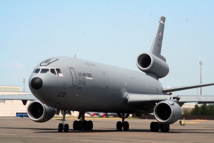 A KC-10 Extender from the 60th Air Mobility Wing, Travis Air Force Base, Calif., taxis for a flight at McChord AFB, Wash., July 25, 2009.  The KC-10 is one of the Air Mobility Command's main air refuleing planes that helps provide "global reach" and the Air Force to "fly, fight and win...in air, space and cyberspace."  (U.S. Air Force Photo/Tech. Sgt. Scott T. Sturkol)