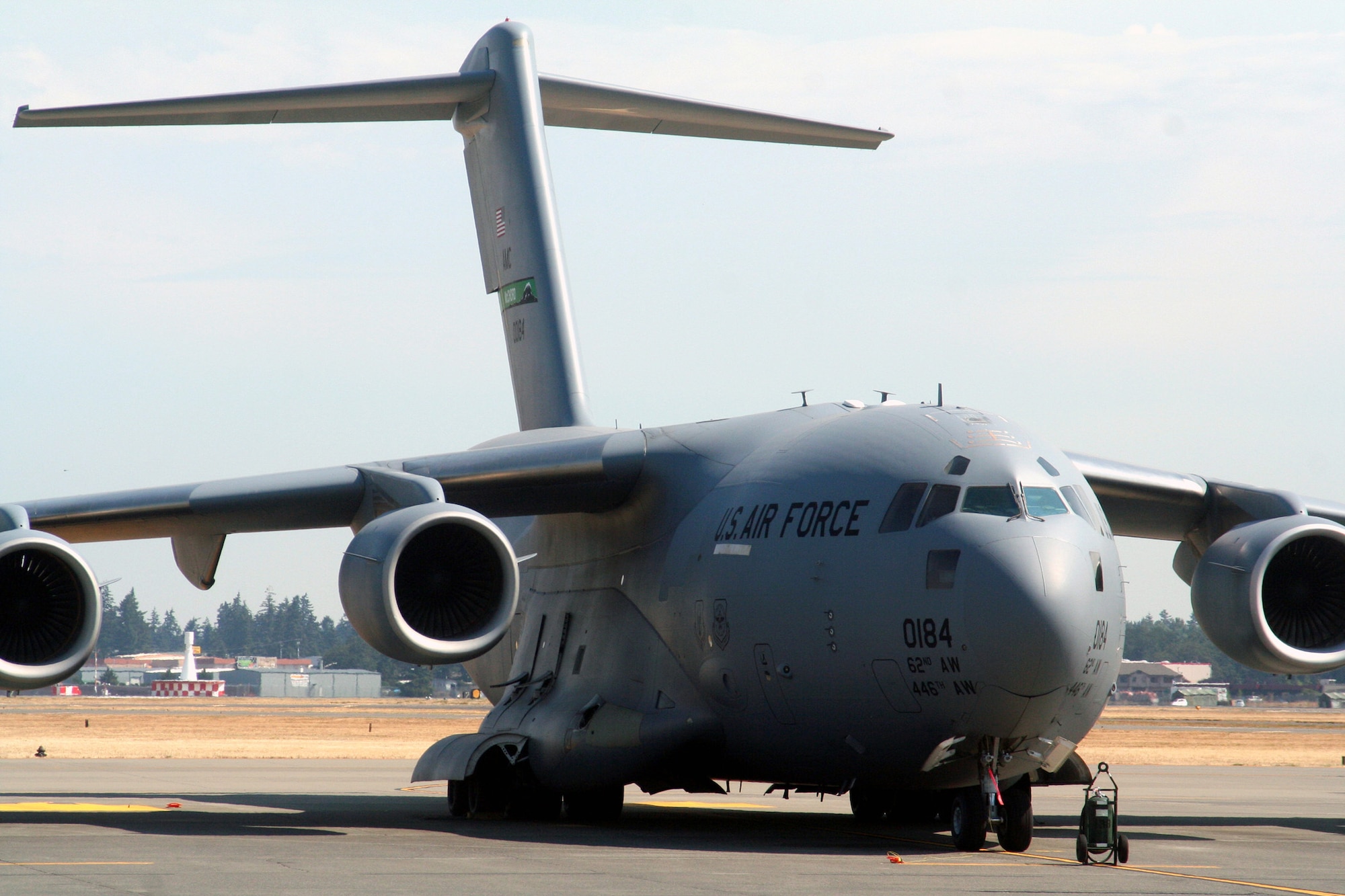 A C-17 from the 62nd Airlift Wing is parked on the flightline at McChord Air Force Base, Wash., July 25, 2009.  The C-17 is one of Air Mobility Command's main airlift aircraft that helps provide "global reach" and help the Air Force to "fly, fight and win...in air, space and cyberspace." (U.S. Air Force Photo/Tech. Sgt. Scott T. Sturkol)