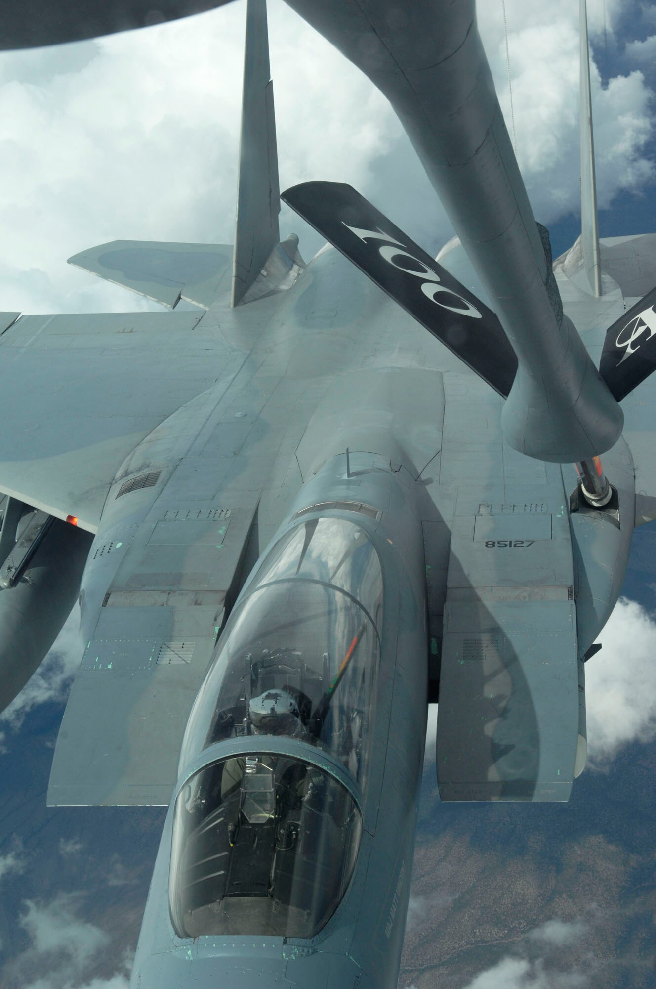 NELLIS AIR FORCE BASE, Nev. -- An F-15C Eagle from 390th Fighter Squadron, Mountain Home Air Force Base, Idaho, moves into refueling position July 24 over the Nevada Test and Training Range during Red Flag 09-4. Red Flag is a realistic combat training exercise involving the air forces of the United States and its allies. The exercise is conducted on the 15,000-square-mile Nevada Test and Training Range, north of Las Vegas. (U.S. Air Force photo by Master Sgt. Kevin J. Gruenwald)