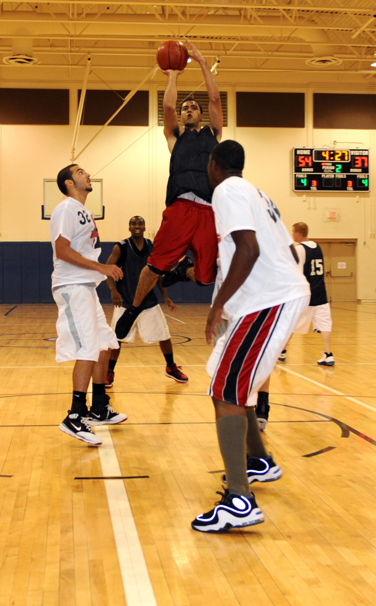 MOUNTAIN HOME AIR FORCE BASE, Idaho -- Patrick McIntyre, The Hawks, goes up for a shot during a base summer league basketball game at the Gunfighter Fitness Center July 23. The Goonies beat the Hawks 62-55 and remain undefeated. (U.S. Air Force photo by Airman 1st Class Renishia Richardson)
