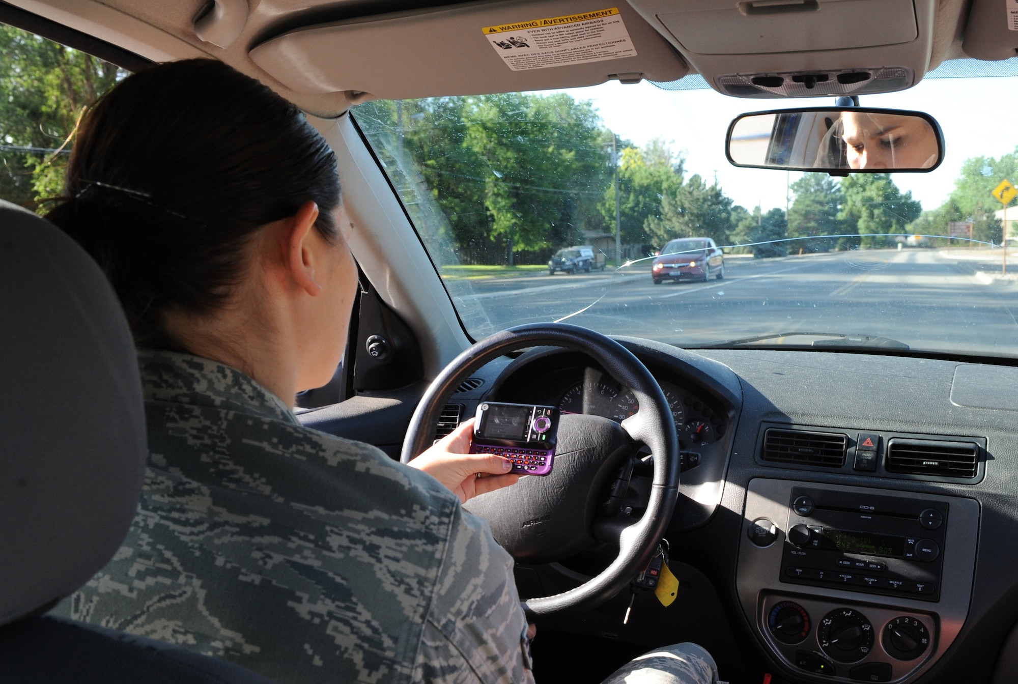 MOUNTAIN HOME AIR FORCE BASE, Idaho-- Using a cell phone without a hands-free device or texting while operating a vehicle on Mountain Home Air Force Base or any other military installations is prohibited.   (U.S. Air Force photo by Airman 1st Class Renishia Richardson)