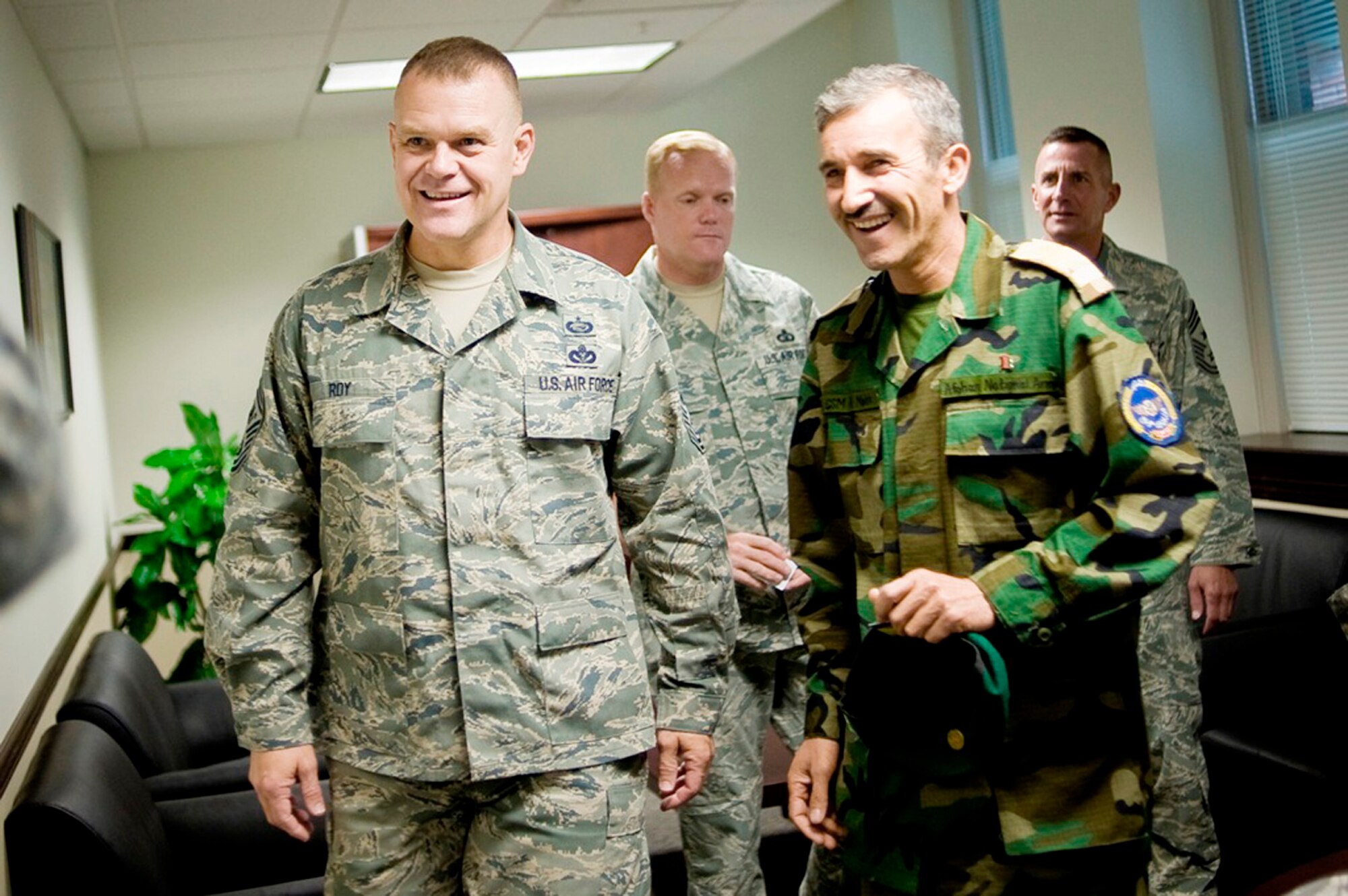 Chief Master Sgt. of the Air Force James A. Roy and Command Sergeant Major of the Afghan Air Corps Abdul Malik talk during Air Mobility Rodeo 2009 July 23 at McChord Air Force Base, Wash. Both are the top enlisted members of their respective services. (U.S. Air Force photo/Abner Guzman) 

