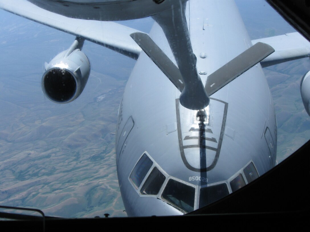 A KC-10 Extender receives fuel from a KC-135 Stratotanker flown by an aircrew that represented McConnell Air Force Base, Kan., at Air Mobility RODEO 2009. The crew earned the trophy for "Best Air Refueling Team" at the international, biennial competition. (U.S. Air Force photo)