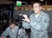 KIRTLAND AFB, N.M. -- A Joint Terminal Attack Party watches a large screen as he handles an ambush scenario on the Joint Close-Air Support Operations Simulator during VIRTUAL FLAG 09-3 on July 2. (U.S. Air Force photo/Noel Getlin) 