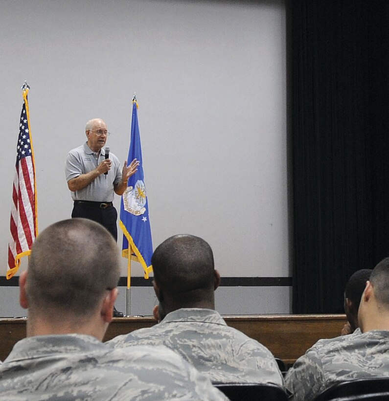 The eighth Chief Master Sergeant of the Air Force, Sam E. Parish, delivers a motivational speech during the 316th Wing awards ceremony at Andrews July 17. Chief Parish spoke about team work, the wingman concept and the important role each career field contributes to the success of the Air Force mission. (U.S. Air Force photo/ Senior Airman Giang Nguyen)