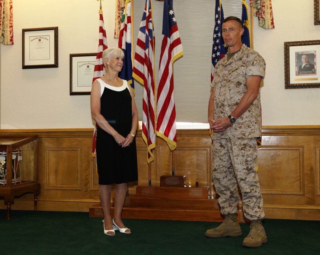 Jeanne R. Hawthorne recently received an award for her “outstanding service and professional accomplishments” while she served as the Deputy Director for Operations and Training with Marine Corps Installations – East and Marine Corps Base Camp Lejeune from January 1997 through December 2008. The award ceremony was held July 29, on the Commanding General’s Quarterdeck in Lejeune Hall where Col. Richard P. Flatau Jr., the base commander, presented Hawthorne the Superior Civil Service Award for her many years of service.::n::