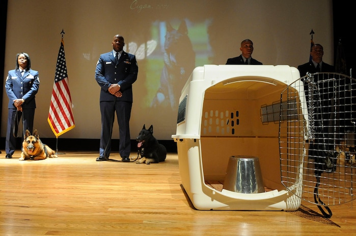 Members of Team Charleston gathered together for a memorial service at Charleston AFB July 24 for Cigan, a military working dog who died of lyphoma at the age of 10. Cigan was assigned to Charleston AFB in 2001 and was recently training with his handler, Staff Sgt. Justin Langley, for a deployment to Afghanistan. The memorial service was followed by a procession to the burial site led by the Patriot Guard Riders at the Military Working Dog Kennel on base. (U.S. Air Force photo/Airman 1st Class Alex Hoachlander)