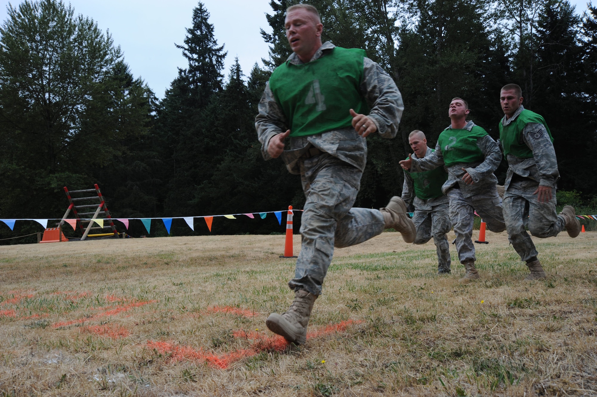 MCCHORD AIR FORCE BASE, Wash.-- Staff Ryan Overcash, 22nd Security Forces Squadron and team lead for Team McConnell’s RODEO security forces team leads his group over the finish line for the combat endurance competition July 23. This competition was the last event for Team McConnell’s RODEO security forces team at this year’s RODEO at McChord AFB, Wash.  (Photo by Tech. Sgt. Chyrece Campbell)  