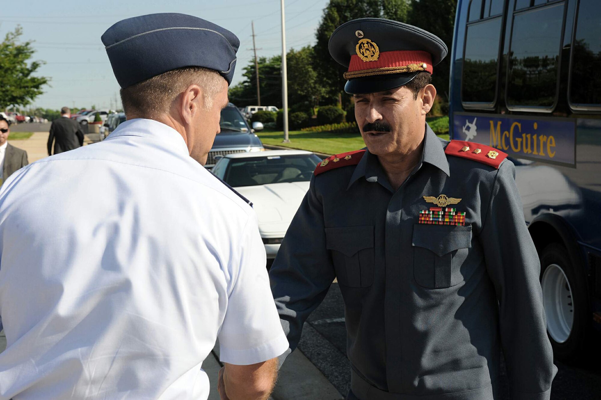 Col. Mark Ellis greets Afghan Maj. Gen. Mohammad Dawran July 13 at the U.S. Air Force Expeditionary Center on Joint Base McGuire-Dix-Lakehurst, N.J. General Dawran, commander of the Afghanistan National Army Air Corps, visited the installation to learn more about the Air Education and Training Command's Air Adviser Course housed at the Expeditionary Center on Fort Dix. Colonel Ellis is the commandant of the Expeditionary Operations School. (U.S. Air Force photo/Staff Sgt. Nathan G. Bevier) 