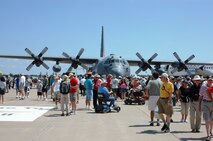 Spectators gather July 29 to see the Air Force Reserve's Modular Airborne Firefighting System, or 'MAFFS II,' at the 2009 Experimental Aircraft Association AirVenture air show in Oshkosh, Wisc.. The AF Reserve's 302nd Airlift Wing participated in this year's air show by demonstrating the new MAFFS II capabilities on July 27 with a live air drop. The air show is known as the world's greatest aviation celebration and attracts hundreds of thousands of aviation enthusiasts from all over the world. The C-130, assigned to the 302nd AW at Peterson Air Force Base, Colo., is equipped with the new MAFFS II system and is on display at EAA AirVenture through July 29. (U.S. Air Force photo/Capt. Jeff Schoen).