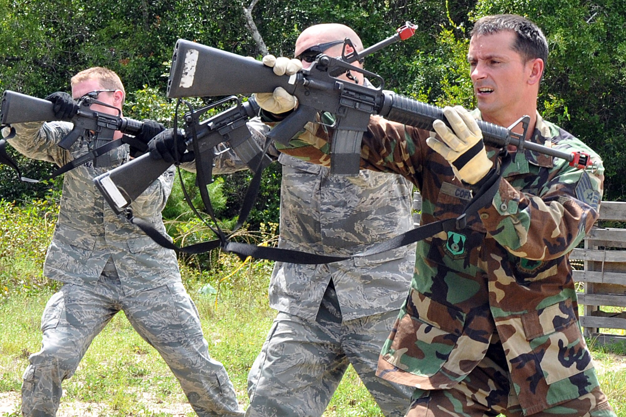 EGLIN AIR FORCE BASE, Fla. –  Airmen practice using their M-16 for hand-to-hand combat during Combat Skills Training here, July 28. CST is a course that covers everything from use of deadly force to salute reporting and is required for most members as a refresher to prepare them for situations they may encounter in theatre. (U.S. Air Force photo/ Airman Anthony Jennings)