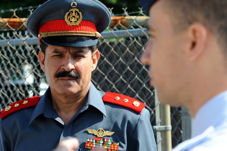 Afghan Maj. Gen. Mohammad Dawran, commander of the Afghanistan National Army Air Corps, listens as Master Sgt. Charles Sherman, Mobility Air Forces Mobile Command and Control Leadership Course director, explains the Mobile Command and Control system July 13 at the U.S. Air Force Expeditionary Center on Joint Base McGuire-Dix-Lakehurst.  General Dawran visited the installation to learn more about the Air Education and Training Command's Air Advisor Course housed at the Expeditionary Center on Fort Dix. (U.S. Air Force Photo/Staff Sgt. Nathan G. Bevier) 