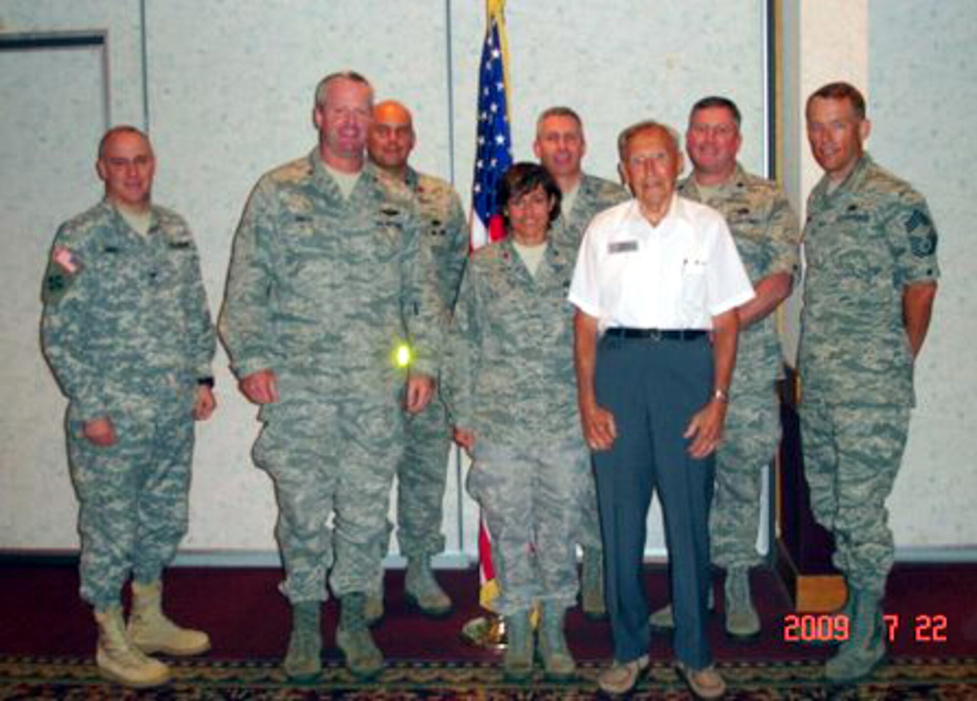 Senior base leadership stand with Lt. Col. (ret.) Robert Hansen, director of the Retiree Activities Office at McGuire, during the Volunteer of the Year luncheon July 22.  Master Sgt. (ret.) David Clapper, of the Willow Grove Air National Guard, Master Sgt. (ret.) Daniel Plashinski, from Wyoming Valley, Penn., Lt. Col. (ret.) Robert Hodges, from the McGuire Passenger Terminal, and Master Sgt. (ret.) Joseph Hayes, from the 87th Medical Group Pharmacy, were all named volunteers of the year. (Courtesy photo)