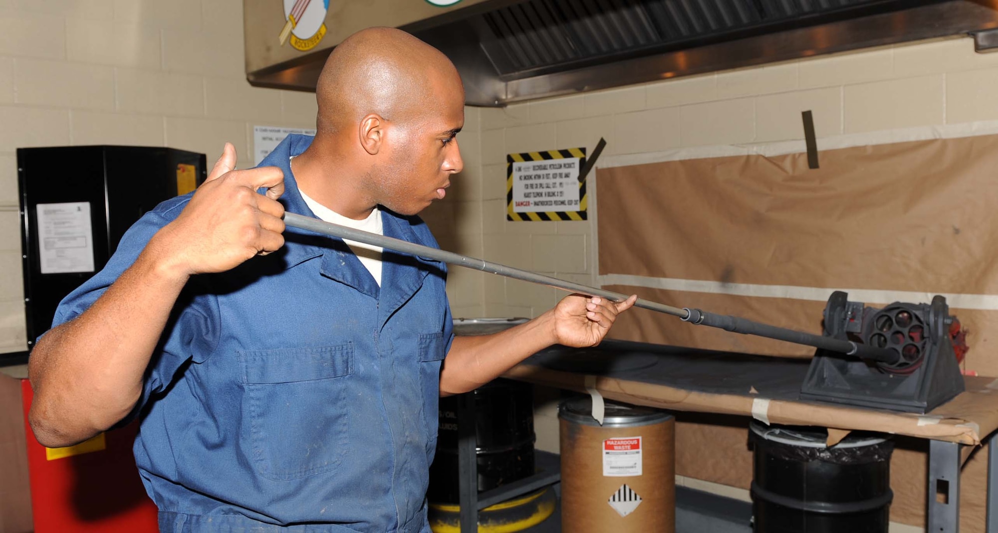 Staff Sgt. Randall Thompson, 4th Equipment Maintenance Squadron armament technician, cleans an F-15E M61A1 20mm Gatling gun barrel at Seymour Johnson Air Force Base, N.C., July 24, 2009. The F-15E can carry 510 rounds for the M61A1, which can be exhausted in five seconds firing 4,000 to 6,000 rounds per minute. (U.S. Air Force photo by Airman 1st Class Gino Reyes)
