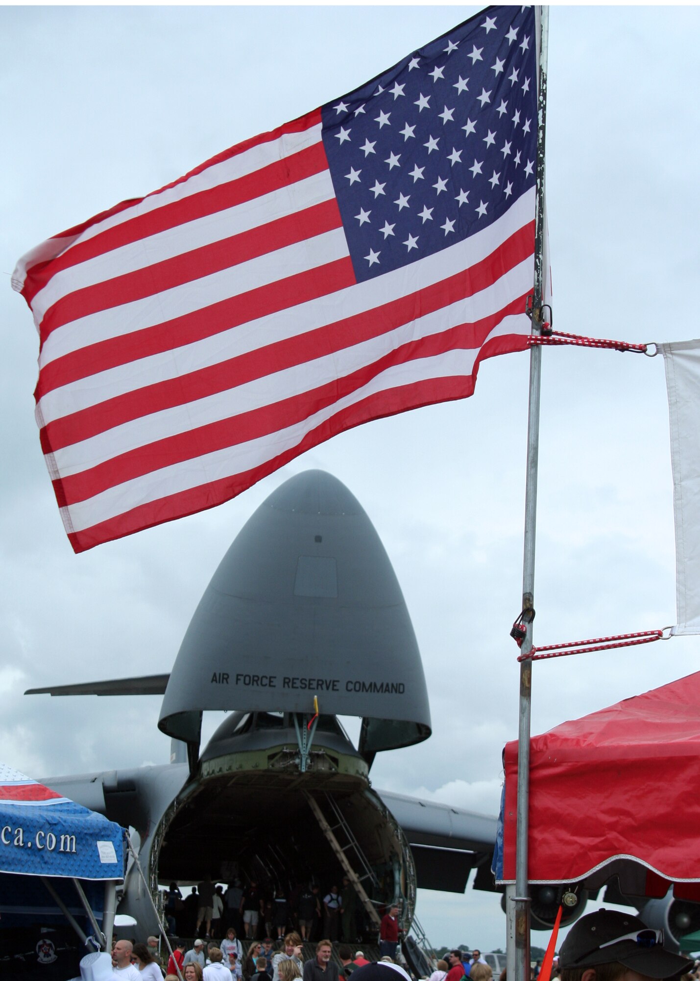 WRIGHT-PATTERSON AIR FORCE BASE, Ohio - A 445th Airlift Wing C-5 Galaxy provided spectators at the Dayton Air Show a cool spot to watch the activities happening around them July 18 and 19. Other 445th AW participation included the 445th Aeromedical Evacuation Squadron demonstrations, a C-5 Galaxy flyover, and the 445 AW Reserve Recruiting office had recruiters talking with air show spectators. (U. S. Air Force photos/Staff Sgt. Ken LaRock) 