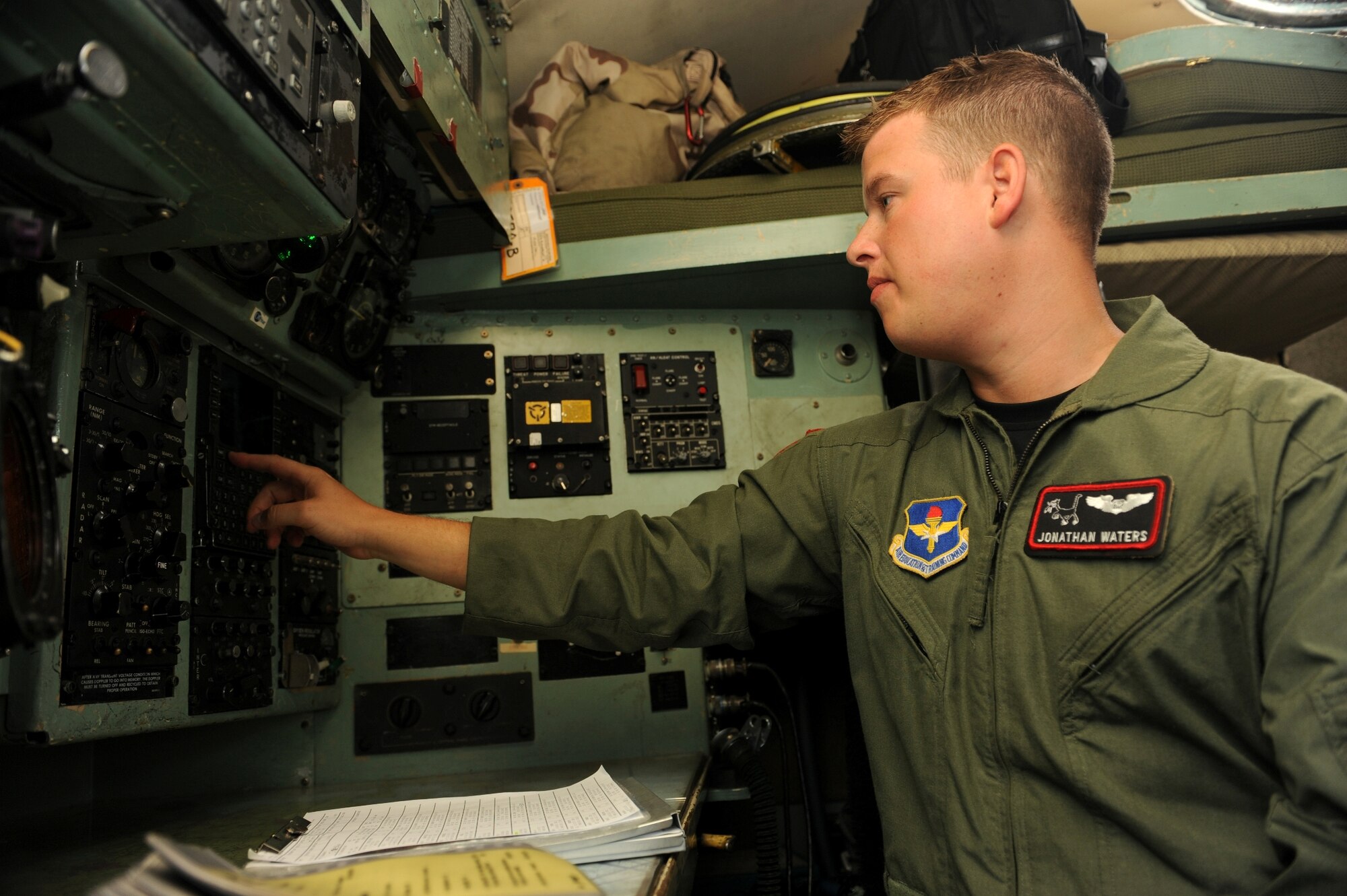 Capt. Jonathan Waters, 62nd Airlift Squadron, pilot prepares to take off in support of a flyover for the repatriated remains of Chief Master Sgt. John Quincy Adam.  Chief Adam's remains were laid to rest at a funeral service held in Kansas City, Kan.  Chief Adam is a Vietnam War veteran who was Missing In Action for more than 40 years. Chief Adam’s remains were discovered in Southeast Asia and he was finally brought home to be laid to rest, giving his family closure in their lives. (U.S. Air Force photo by Senior Airman Jim Araos.)