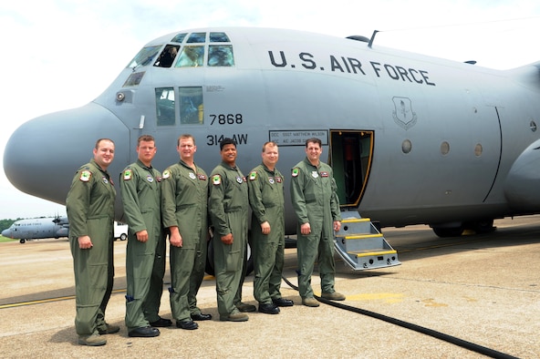 62nd Airlift Squadron aircrew members prepare to take off in support of a flyover for the repatriated remains of Chief Master Sgt. John Quincy Adam.  Chief Adam's remains were laid to rest at a funeral service held in Kansas City, Kan.  Chief Adam is a Vietnam War veteran who was Missing In Action for more than 40 years. Chief Adam’s remains were discovered in Southeast Asia and he was finally brought home to be laid to rest, giving his family closure in their lives. (U.S. Air Force photo by Senior Airman Jim Araos.)