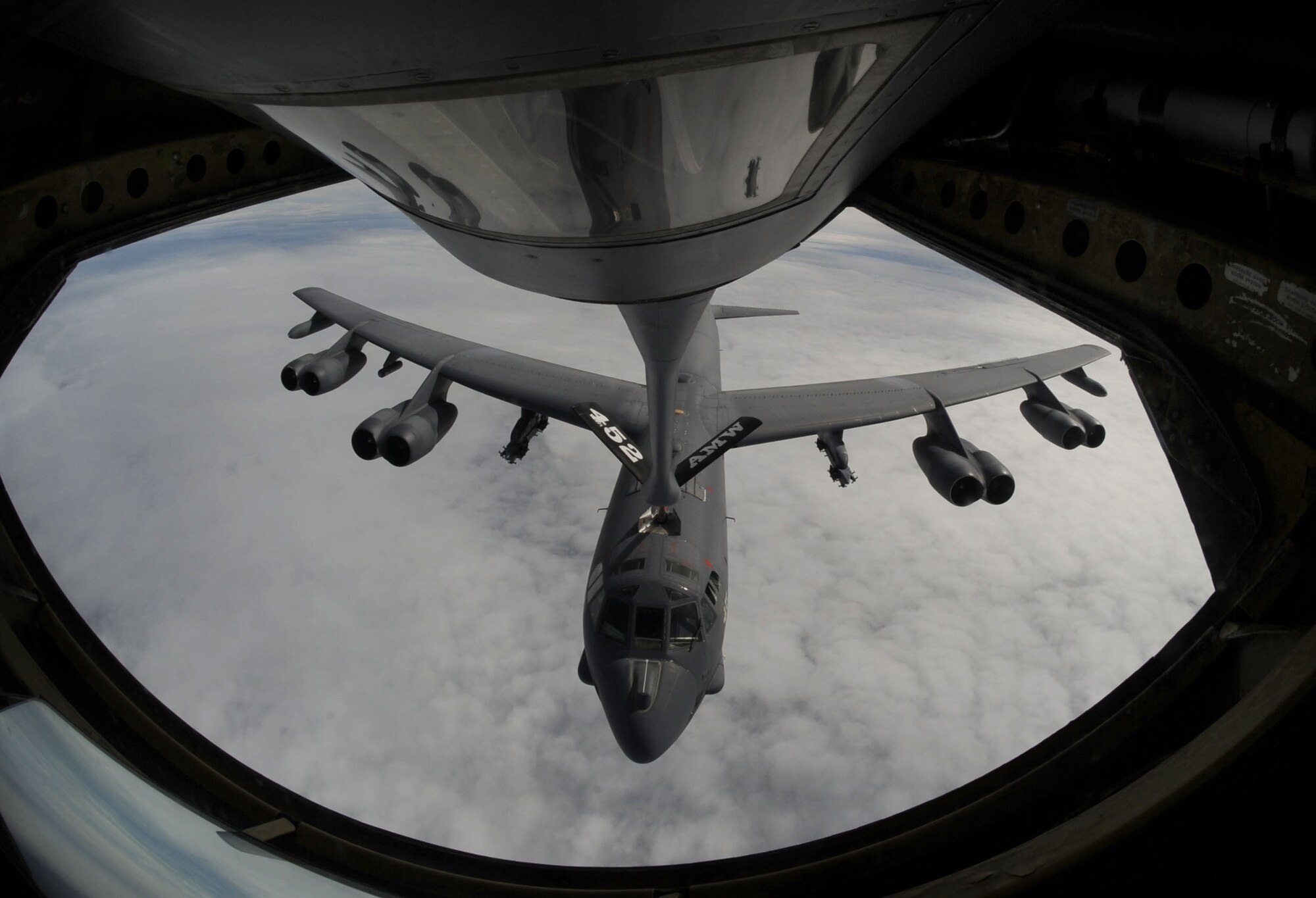 A B-52 Stratofortress aircraft approaches a KC-135 Stratotanker aircraft to refuel over the Pacific Ocean July 13, 2009. Airmen from the 506th Expeditionary Refueling Squadron, March Air Force Reserve Base, Calif., are deployed to Andersen Air Force Base, Guam, to support U.S. Pacific Command theater security package and continuous bomber presence in the Asia-Pacific region.  (U.S. Air Force Photo/Senior Airman Christopher Bush) 