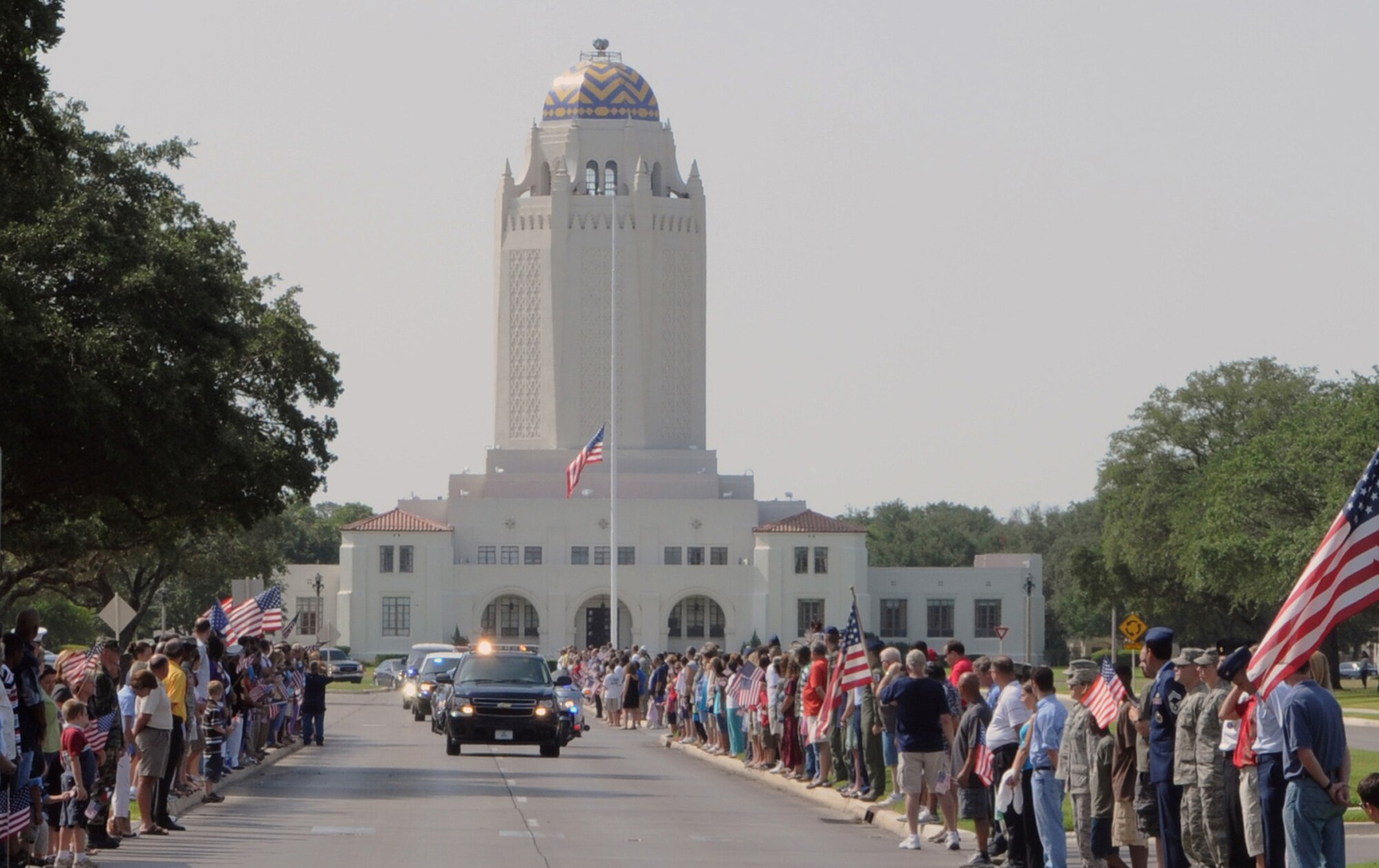 The motorcade carrying the casket of Marine Corps Lance Cpl. Brandon Lara enters Harmon Drive July 26 at Randolph Air Force Base, Texas. (U.S. Air Force photo/Don Lindsey) 