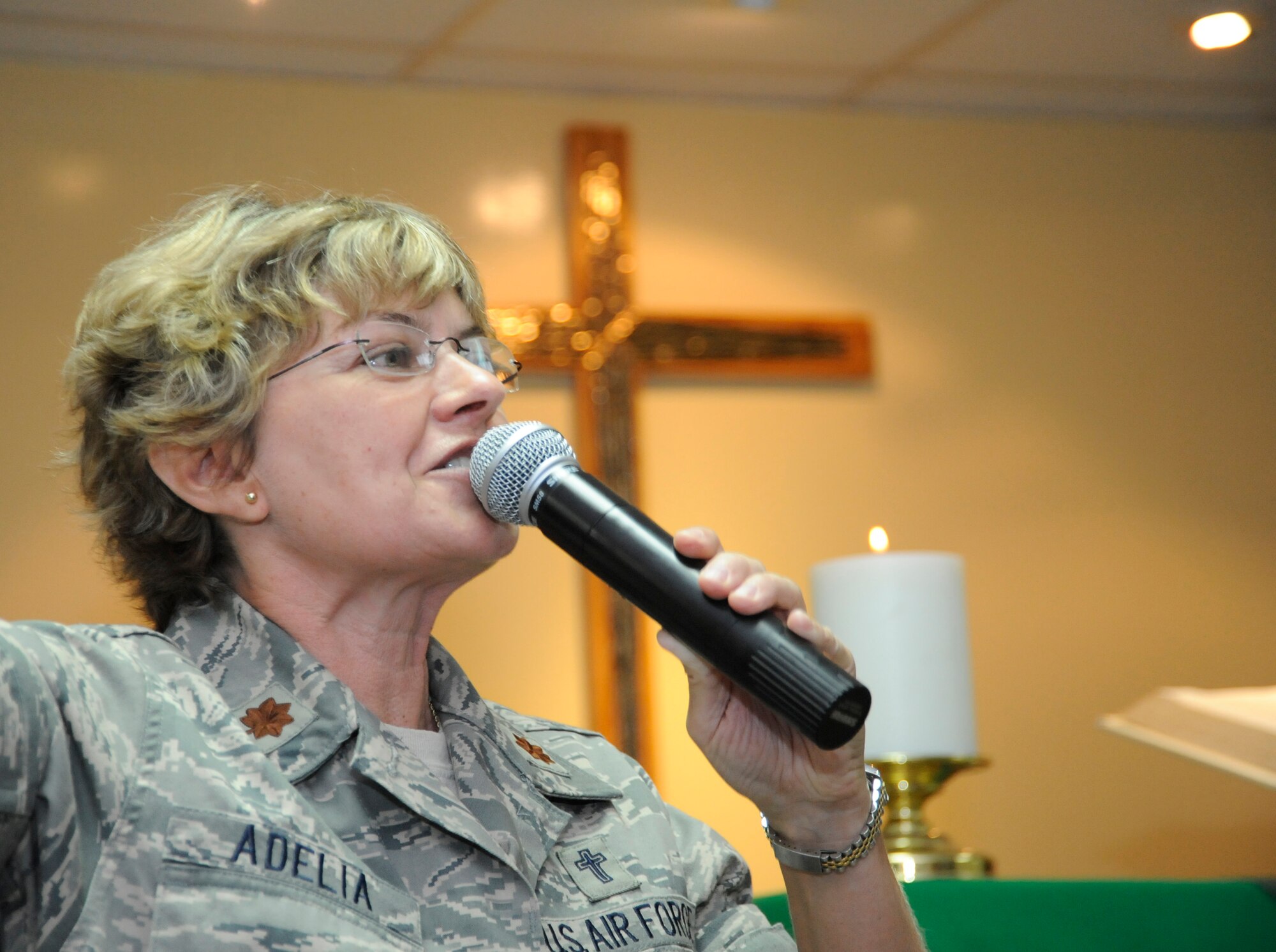 SOUTHWEST ASIA – Chaplain (Maj.) Laura Adelia, 380th Air Expeditionary Wing, speaks during a sermon at the Seven Sands Chapel July 19. Chaplain Adelia is deployed from 162nd Fighter Wing, Arizona Air National Guard, Tucson, Ariz., and hails from Phoenix Ariz. (U.S. Air Force photo/Senior Airman Stephen Linch)