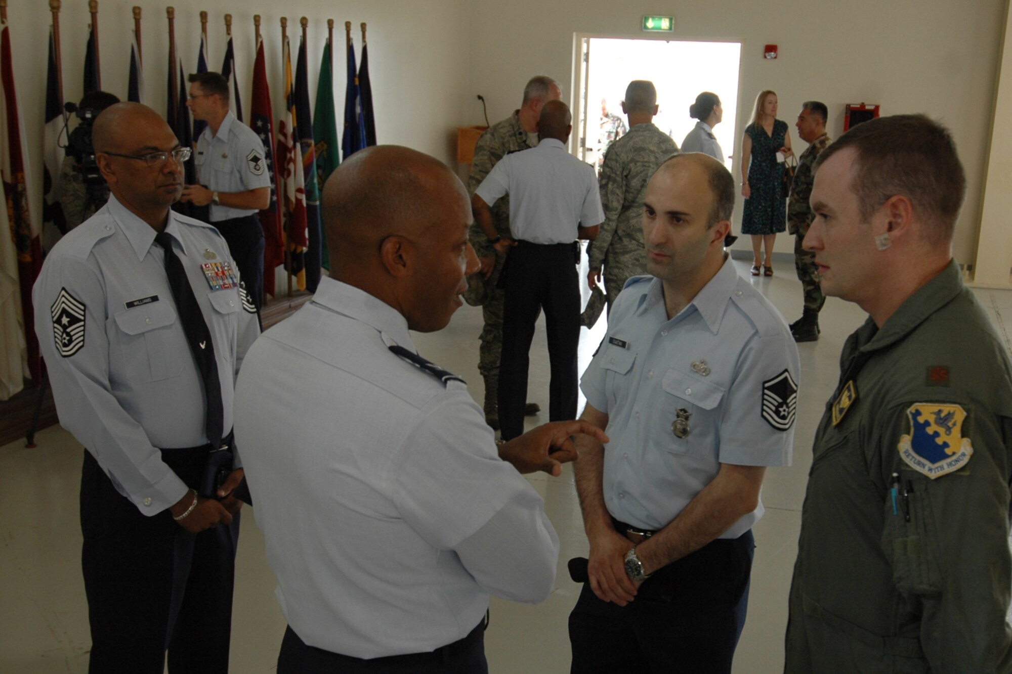 Col. C.Q. Brown Jr., 31st Fighter Wing commander, (center), met with base Airmen following his first commander's call with base personnel here July 27, 2009.  The commander outlined his mission and vision for the wing.  (U.S. Air Force photo/Staff Sgt. Mercedes Crossland)