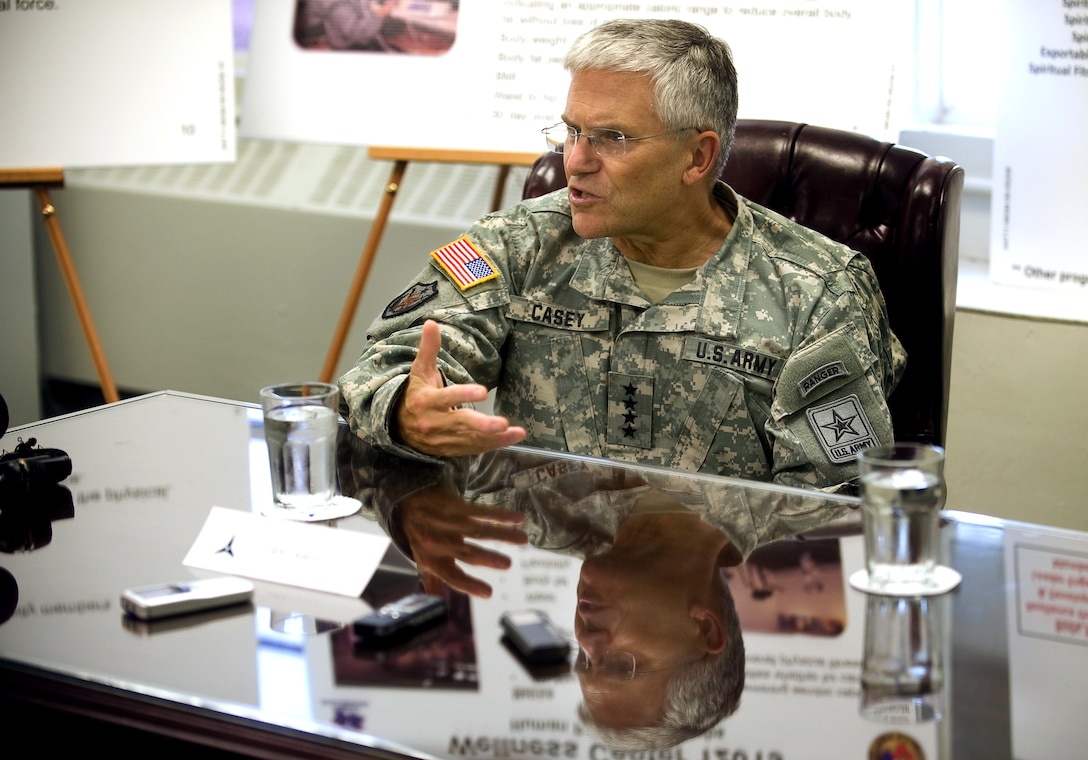 U.S. Army Gen. George W. Casey Jr., Army chief of staff, answers questions after  touring the Resiliency Campus on Fort Hood, Texas, July 28, 2009. "I'm very impressed with the idea of consolidating the major elements of fitness all in one place,"  he said.