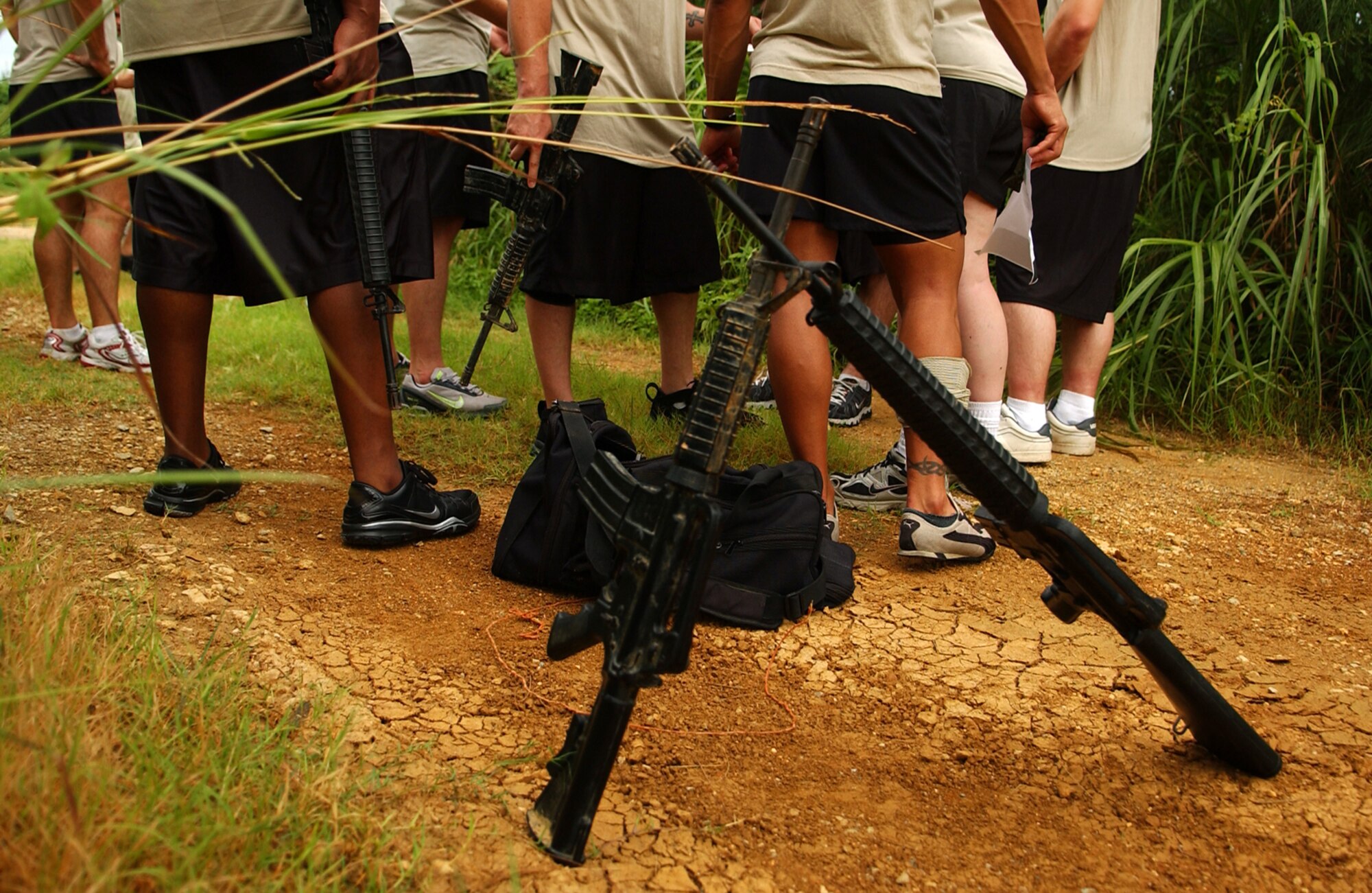 Students from the Airman Leadership School conduct problem solving for a scenario during the Combat Leader Fitness/Mental Challenge July 27, Kadena Air Base, Japan. The Airmen learn leadership and followership skills as they undergo the course coordinated by the 554th Red Horse Squadron and the Erwin Professional Military Education.  (U.S. Air Force photo/Tech. Sgt. Rey Ramon)          