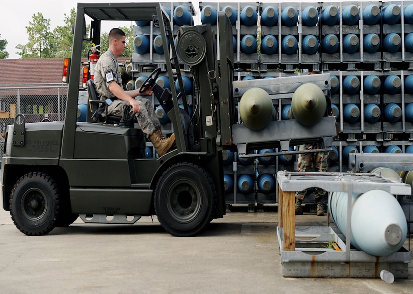 MOODY AIR FORCE BASE, Ga. -- Airman 1st Class Brian Mathis, 23rd Equipment Maintenance Squadron munitions flight stockpile surveillance crewmember, moves a missile crate here July 15. The 23rd EMS munitions flight separates their munitions stockpiles into three different buildings to minimize dangerous work areas. (U.S. Air Force photo by Airman 1st Class Joshua Green)