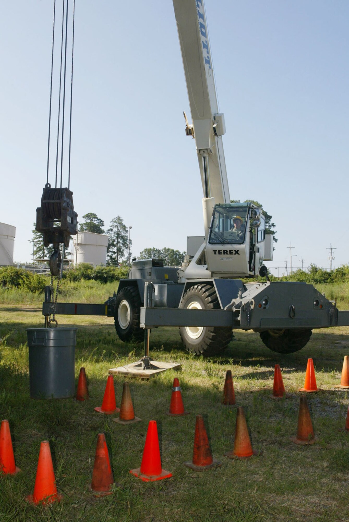 Students of the week-long crane course test their skills by maneuvering a weighted object through a pre-designed course at the Air Force Reserve Command Expeditionary Combat Support Training Certification Center here July 24. The course focus was on proper operations of the heavy equipment with an emphasis on safety and was conducted for those students requiring initial and crane recertification. (U.S. Air Force photo/Don Peek)