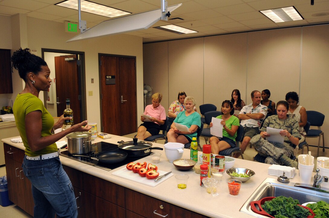 BUCKLEY AIR FORCE BASE, Colo. – Sandy Jefferson teaches a Healthy Heart Cooking Demonstration class at the Buckley Health and Wellness Center July 17. Participants learned alternative methods of cooking your favorite dishes: ways to lower fat, sodium and cholesterol, making the dishes you love heart healthier. (U.S. Air Force photo by Senior Airman John Easterling)