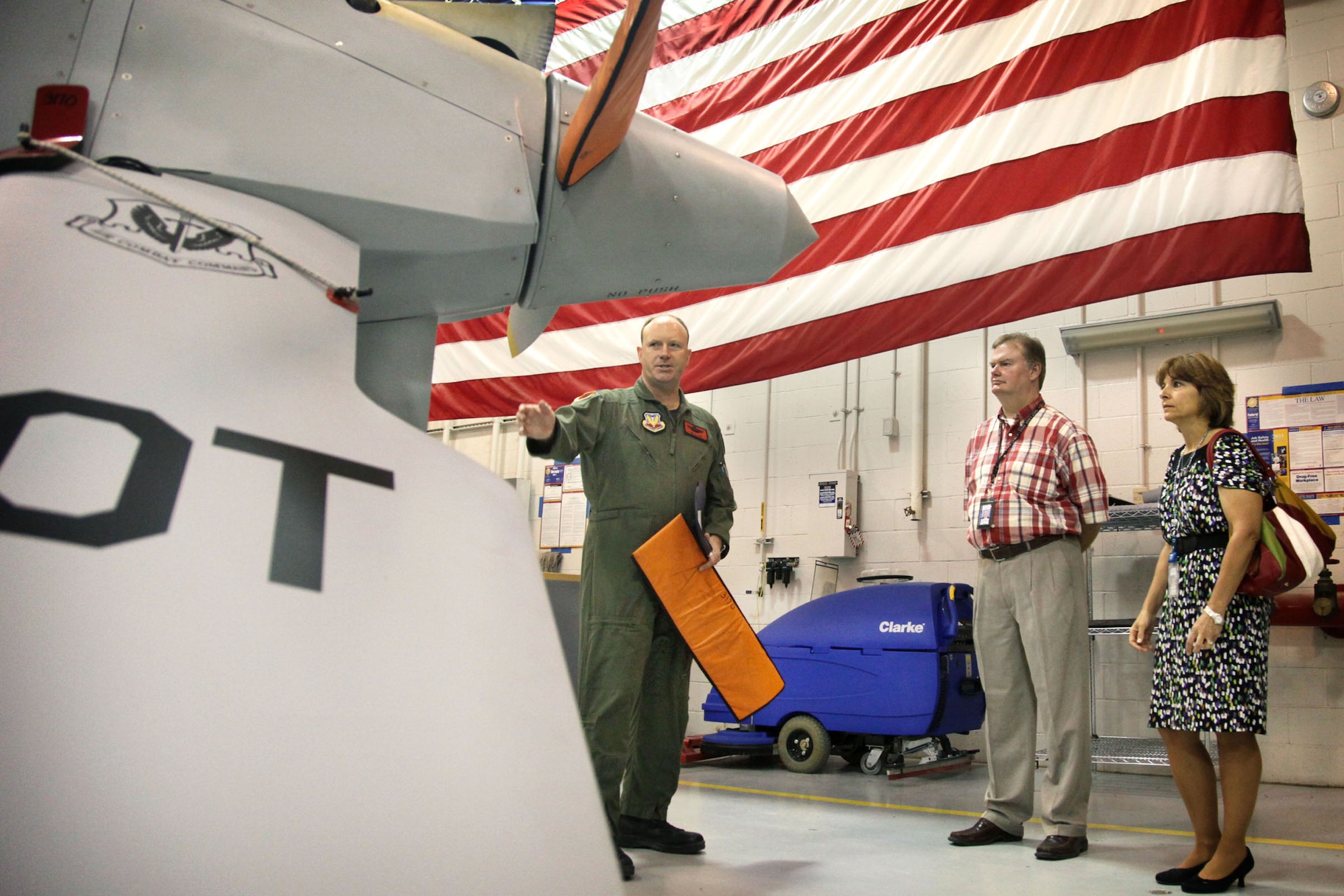 CREECH AFB, Nev. -- Lt. Col. James Clark, 432d Operations Group deputy commander, provides an MQ-1B Predator familiarization brief at Creech Air Force Base to members of the Federal Aviation Administration.  The FAA team from the Salt Lake City Air Route Traffic Control Center visited here July 22 to gain a better understanding of how to integrate military training operation within airspace under their jurisdiction. (USAF photo/ Lawrence R. Crespo)