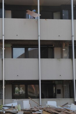 German contractors strip down the dorms in preparation for demolition, Ramstein Air Base, Germany, July 29, 2009. A team recently came in and assessed all of the facilities throughout the Kaiserslautern Military Community. The plan is basically to tear down the oldest and worst buildings that have outlived their life cycle. (U.S. Air Force photo by Airman 1st Class Caleb Pierce) 