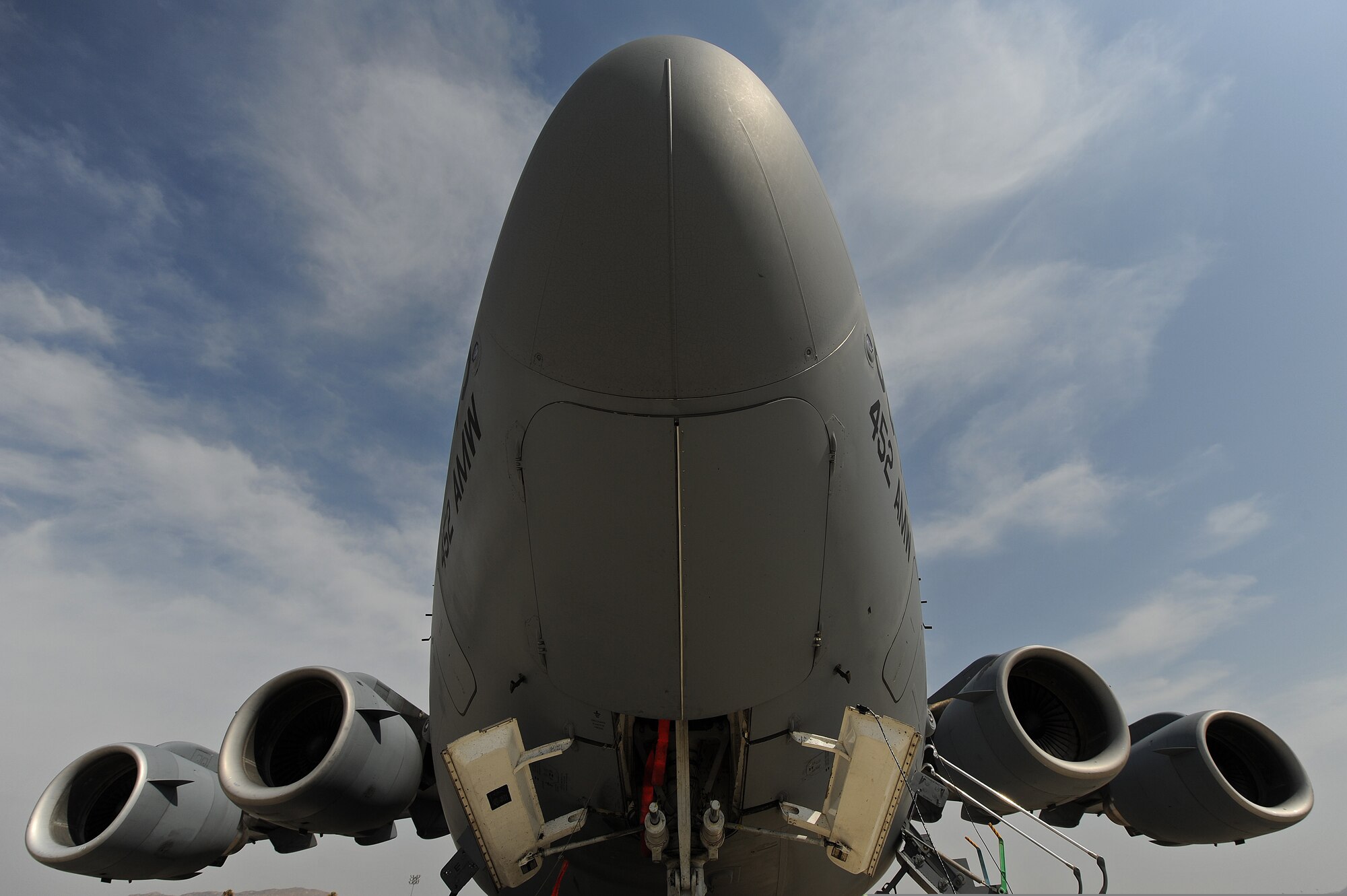 A C-17A Globemaster III cargo aircraft sits on the flightline at March Air Reserve Base, Calif., July 24, 2009, before the Cactus mission from the 452nd Air Mobility Wing. The Cactus provides aircrew training for C-17 crews while at the same time providing transportation to and from their unit training assembly or drill weekend at March ARB for Airmen from Arizona and Nevada. (U.S. Air Force Photo/Master Sgt. Rick Sforza/Released)