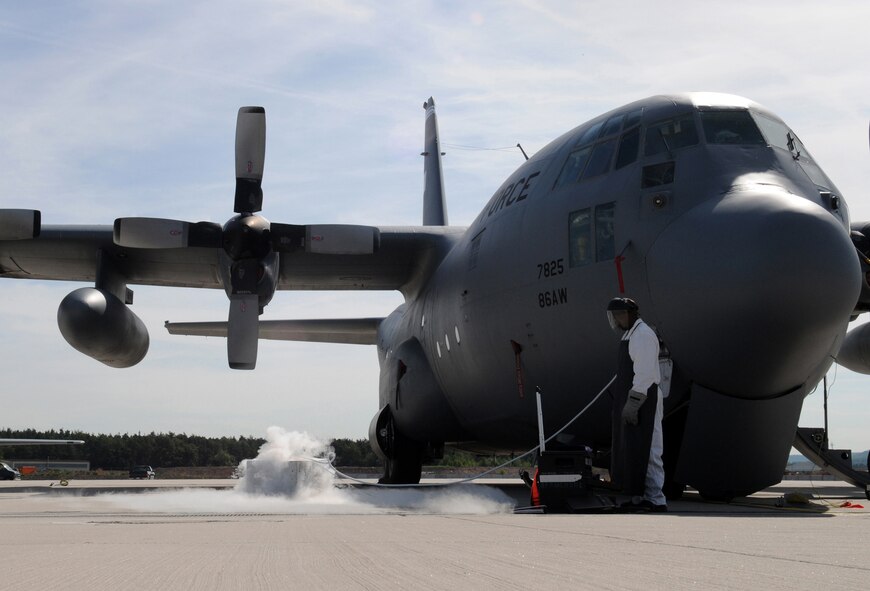 U.S. Air Force Tech. Sgt. Carlos Bennett, 86th Aircraft Maintenance Squadron, services liquid oxygen to a C-130E Hercules July 29, 2009, Ramstein Air Base, Germany. Due to its extremely low temperature, varying from minus 200 to minus 300 degrees Fahrenheit, liquid oxygen requires careful handling and specialized equipment. (U.S. Air Force photo by Airman 1st Class Grovert Fuentes-Contreras)(Released)