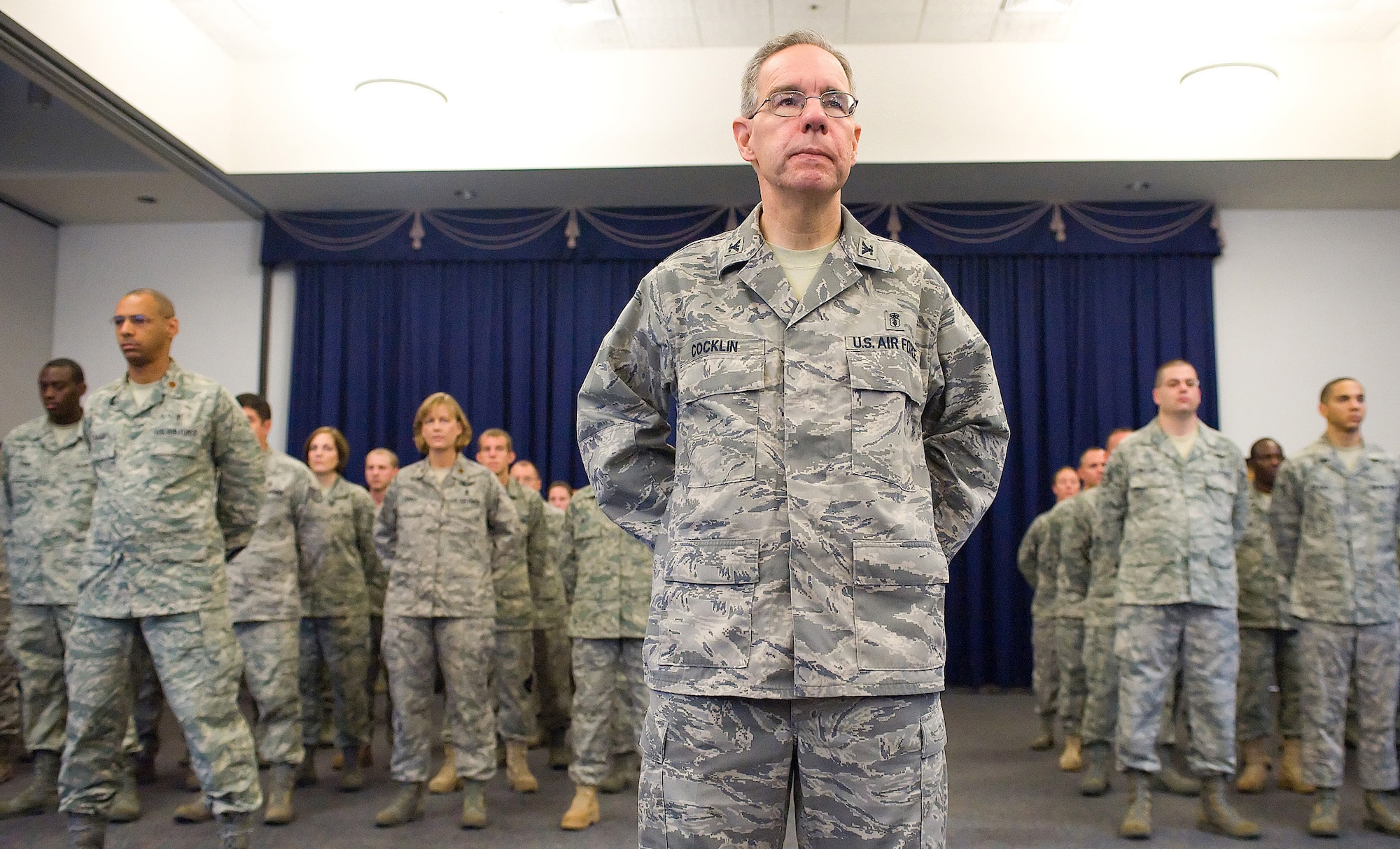 (Front) Col. James Cocklin, 436th Dental Squadron commander, stands at parade rest during the 436th Medical Group change-of-command ceremony July 20 at Dover Air Force Base, Del. Airmen from the 436th MDG stood in formation to witness the change of command. (U.S. Air Force photo/Tom Randle)