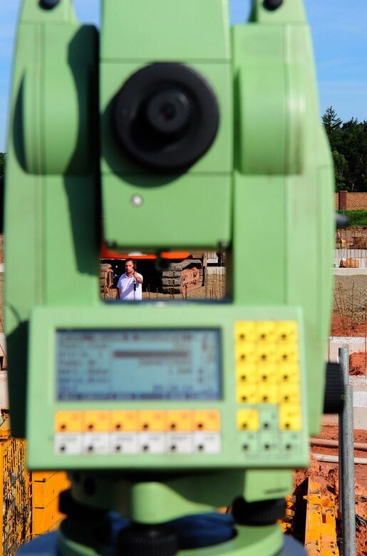 Kaiuwe Natale with VT Data Company takes survey measurements on the construction site of the future Joint Mobility Processing Center on Ramstein AB, Germany, 29 July 2009. (U.S. Air Force photo by Staff Sgt. Jocelyn Rich)