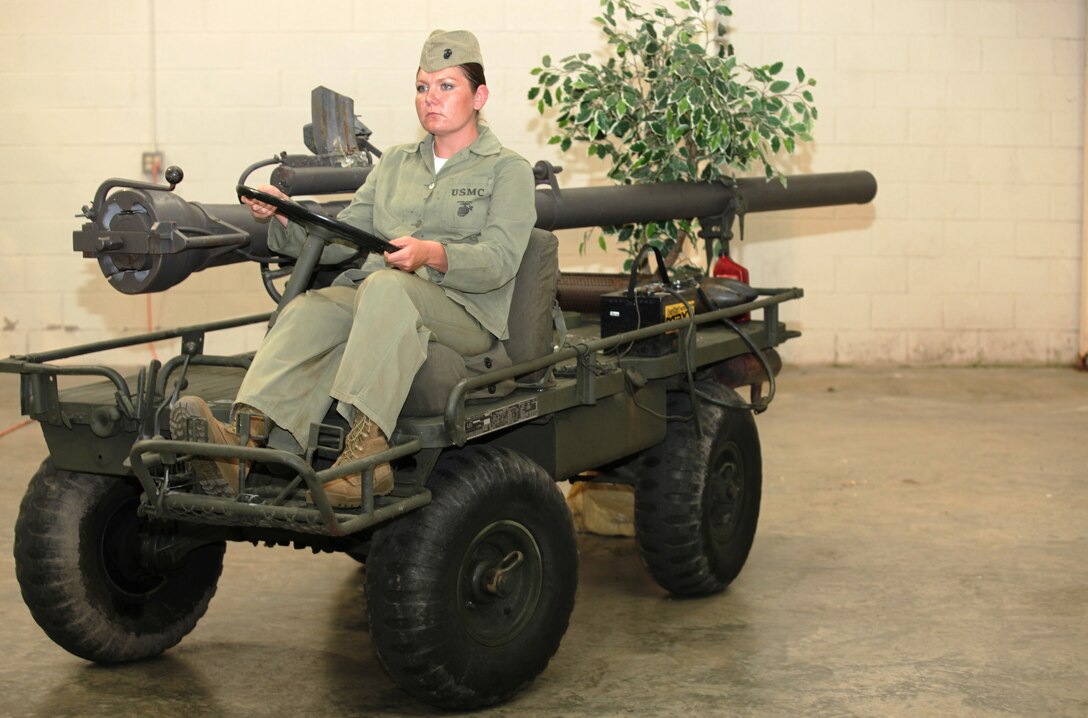 Service members, retirees and friends within the local community gathered together at the Jacksonville American Legion, July 31, to enjoy ‘A Summers Night with our Heroes,’ an event, to raise money for the Museum of the Marine. As patrons moseyed around the building, they were able to observe the old World War II and Vietnam War vehicles. Live mannequins dressed in period uniforms gave a taste of how the Marine Corps has evolved over the years, while it brought to life a bit of history. ::n::