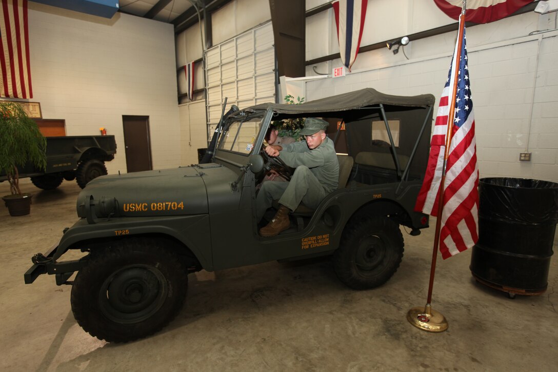 Service members, retirees and friends within the local community gathered together at the Jacksonville American Legion, July 31, to enjoy ‘A Summers Night with our Heroes,’ an event, to raise money for the Museum of the Marine. As patrons moseyed around the building, they were able to observe the old World War II and Vietnam War vehicles. Live mannequins dressed in period uniforms gave a taste of how the Marine Corps has evolved over the years, while it brought to life a bit of history. ::n::