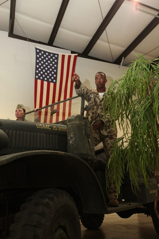 Service members, retirees and friends within the local community gathered together at the Jacksonville American Legion, July 31, to enjoy ‘A Summers Night with our Heroes,’ an event, to raise money for the Museum of the Marine. As patrons moseyed around the building, they were able to observe the old World War II and Vietnam War vehicles. Live mannequins dressed in period uniforms gave a taste of how the Marine Corps has evolved over the years, while it brought to life a bit of history. ::n::