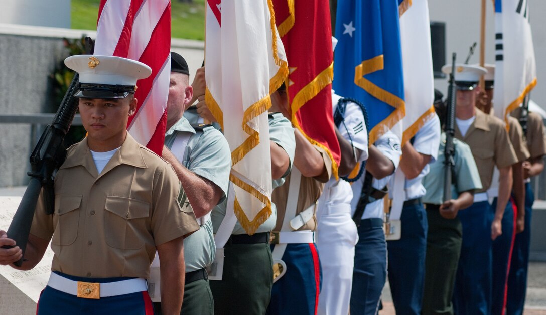 Hawaii-based service members perform in a joint service color guard July 31 during the 56th Korean War Armistice Day Ceremony at the National Memorial Cemetery of the Pacific. Dozens of veterans, their friends and family attended the wreath laying ceremony in memory of those who fought, died and did not return. (Official Marine Corps Photo by Sgt. Juan D. Alfonso)(released)