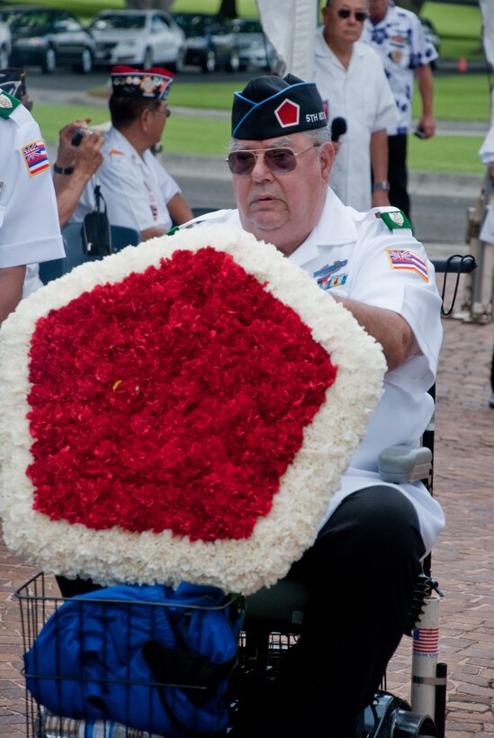 A Korean War Veteran who served with the 5th Marine Regimental Combat Team prepares to lay a wreathe in memory of his fellow veterans July 31 during the 56th Korean War Armistice Day Ceremony at the National Memorial Cemetery of the Pacific. Dozens of veterans, their friends and family attended the wreath laying ceremony in memory of those who fought, died and did not return.  (Official Marine Corps Photo by Sgt. Juan D. Alfonso)(released)
