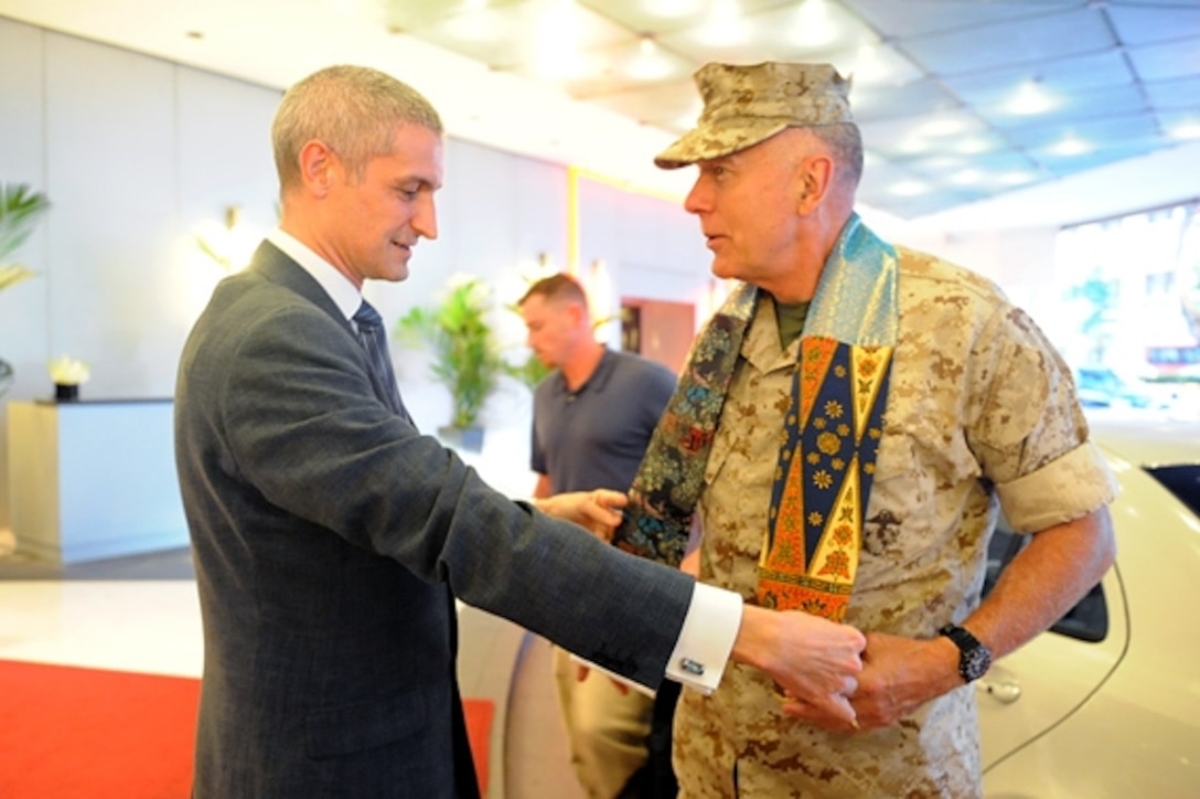 Photos of Sgt. Jose Esquivel, a communications chief with the Marine Corps Tactics and Operations Group, covered several poster boards and were set up inside the Combat Center’s Protestant Chapel July 31 to honor the life of a Marine killed in a car accident July 19.