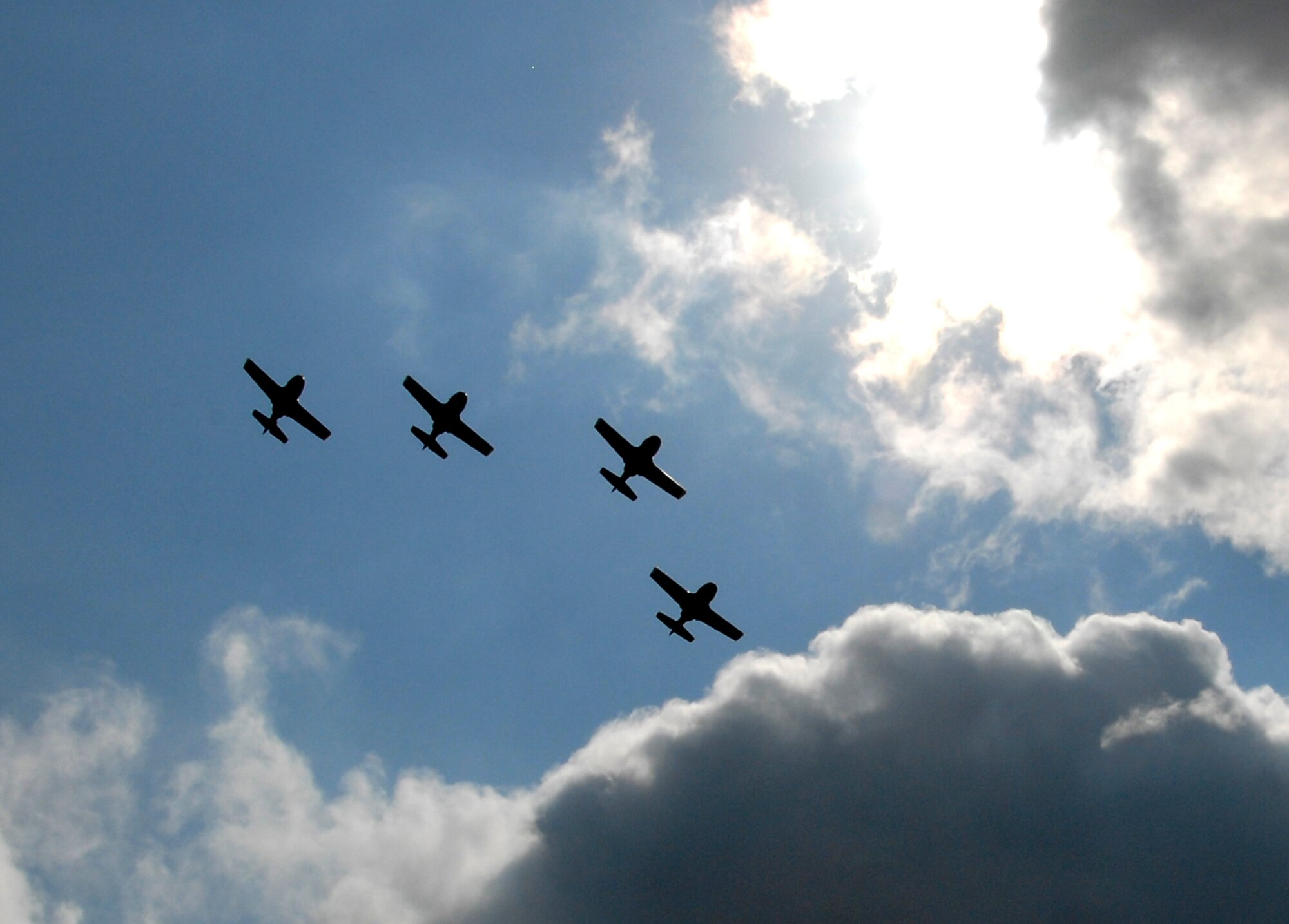 Four of the last seven T-37 Tweets perform a flyover July 31 at Sheppard Air Force Base, Texas, during a ceremony that officially retired the primary trainer. The durable and reliable Tweet served as the introductory pilot training aircraft for more than half a decade. (U.S. Air Force photo/Mike Litteken)